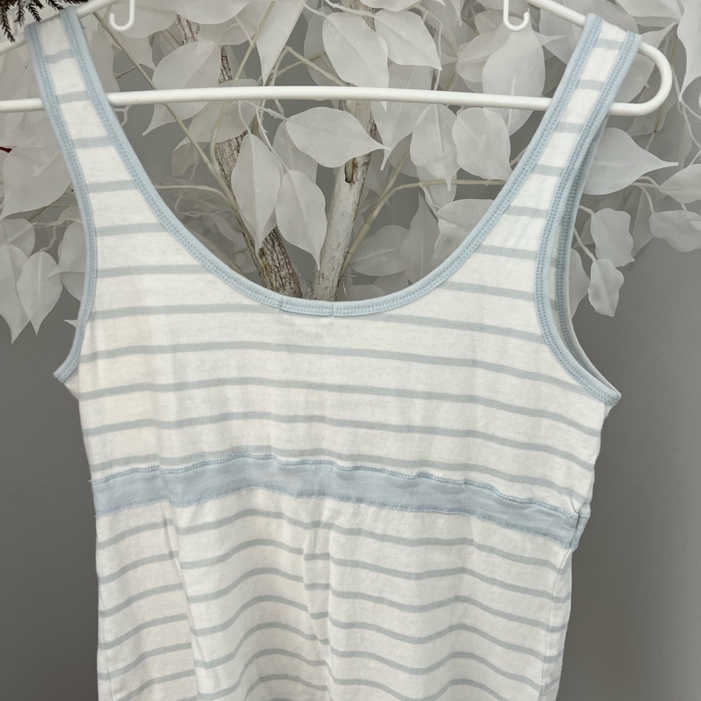 Super cute and cool baby blue and white  striped tank top.
